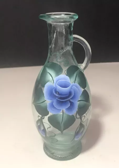 https://www.picclickimg.com/DpwAAOSwU-1hkrTD/Vintage-Blue-Glass-Oil-Bottle-With-Signed-Hand.webp