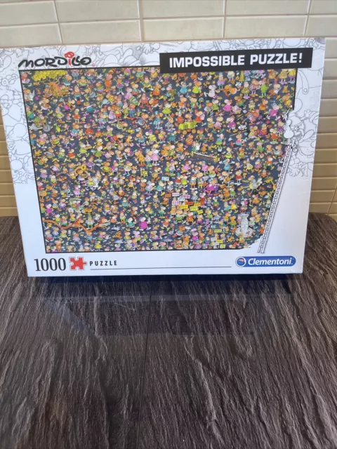 Puzzle 1000 pièces : Impossible puzzle : Mordillo - Clementoni