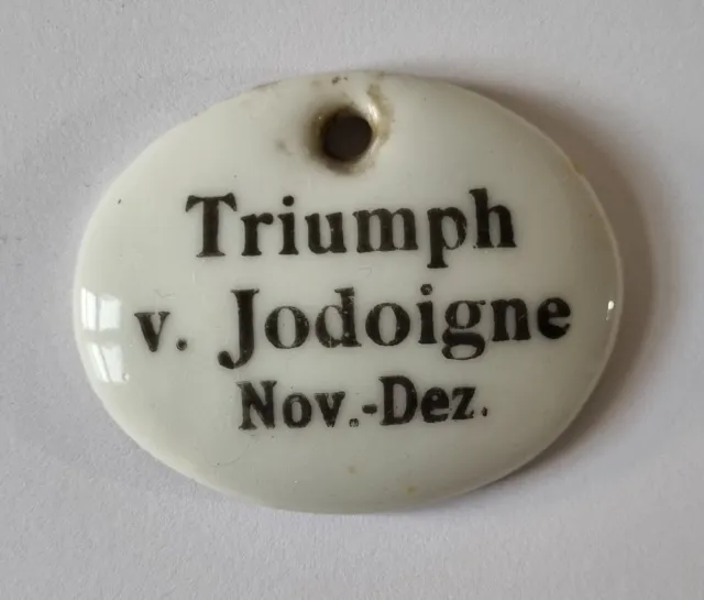 Nette Porzellan Plakette "Triumph v. Jodoigne Nov. - Dez." um 1900 aus Apotheke