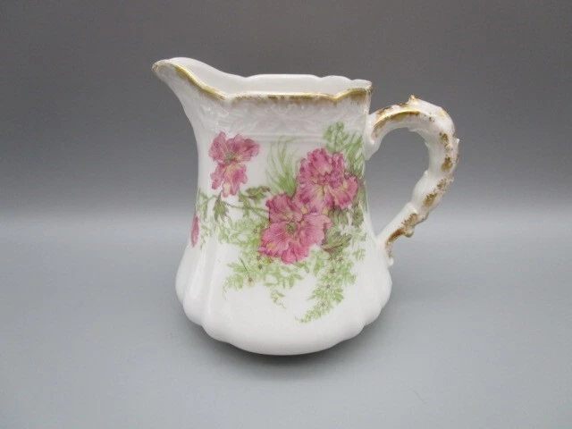 Pichet a lait ancien en porcelaine de Limoges