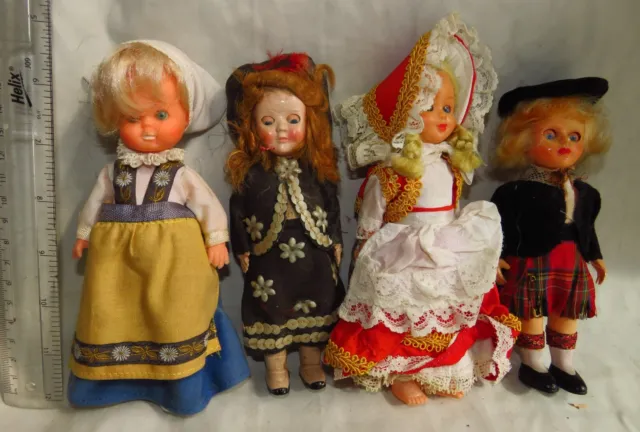 4 small child costume dolls