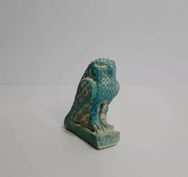 A statue of the ancient Egyptian falcon god Horus made of antique Egyptian stone