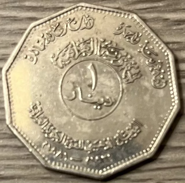 IRAQ 1 DINAR OF THE 50th ANNIVERSARY OF THE IRAQI AIR FORCE OF 1981 .RARE COIN. 2