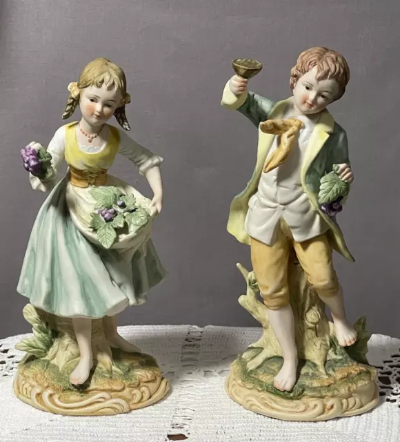 Ethan Allan American Traditional Interiors Boy & Girl Celebrating Figurines Set