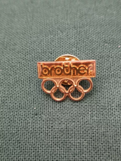 Pin's Pins Pin JO Jeux OLYMPIQUE Sponsor Logo "brother"