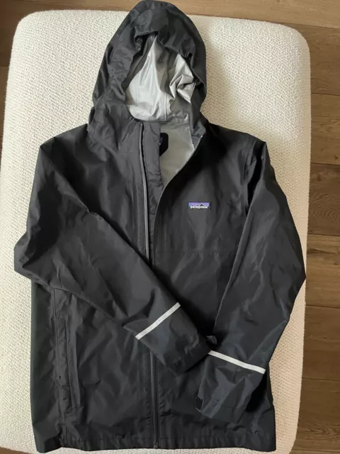 Patagonia rain jacket kids size 12 blk -perfect condition, barely used if at all