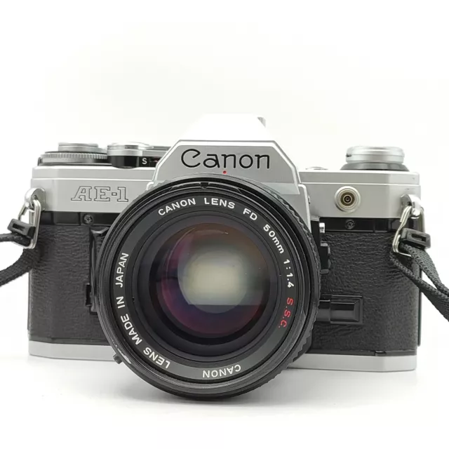 Canon AE-1 Silver SLR Film Camera + Canon FD 50mm f/1.4 S.S.C. - GOOD