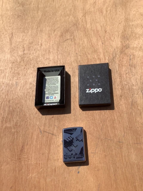 Unused Zippo Windproof Cigarette Lighter Boxed 200 Planeta Rock And Roll