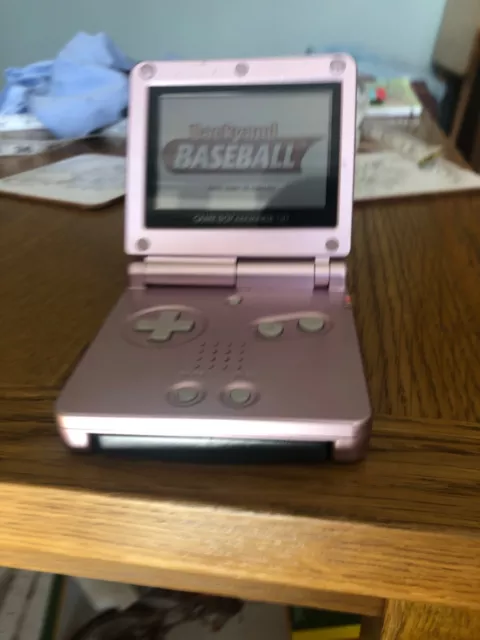 Nintendo gameboy advance sp in pink with baseball game