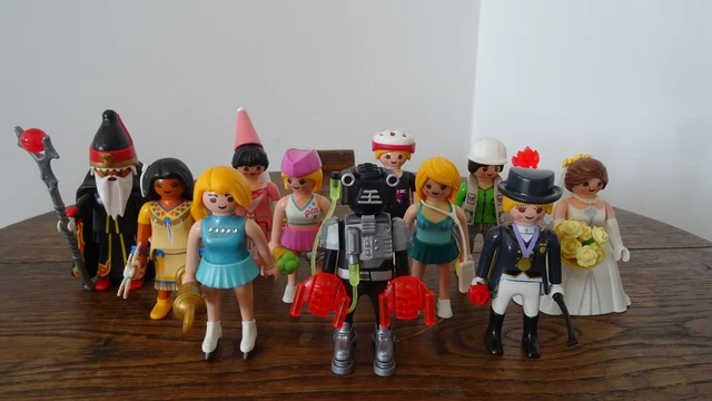 PLAYMOBIL Lot de 11 figurines (sachets surprises) robot, mariée, indienne...