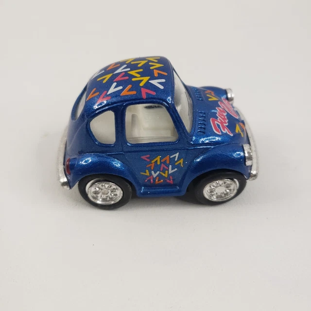 Vintage Kintoy Pull & Go Volkswagen Beetle VW Bug White Flowers Awesome Die Cast