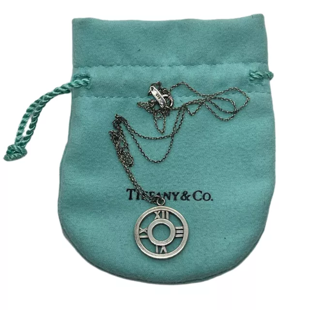 Tiffany & Co. Silver Atlas Roman Numeral Medallion Round Pendant Womens Necklace