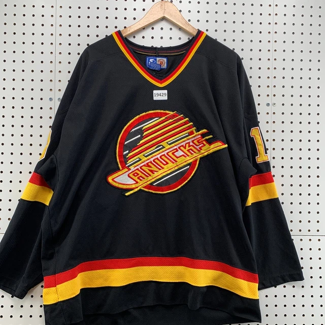 canucks retro black skate jersey
