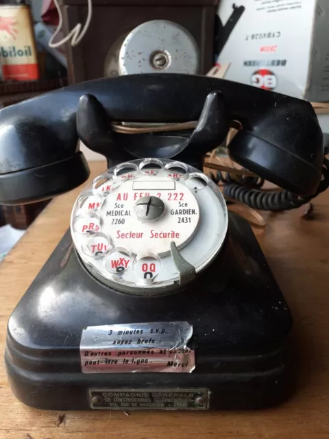 ancien téléphone bakélite noir