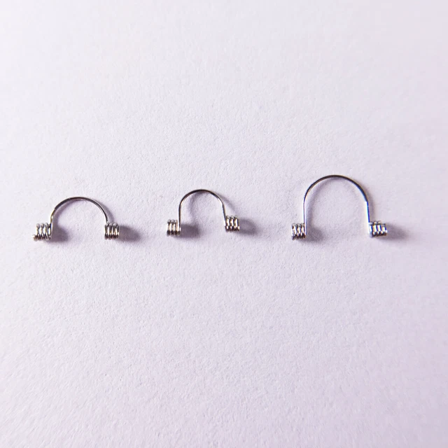 100Pcs Dental Anterior Spring Teeth Torque Rectangular Springs Door Orthodontic