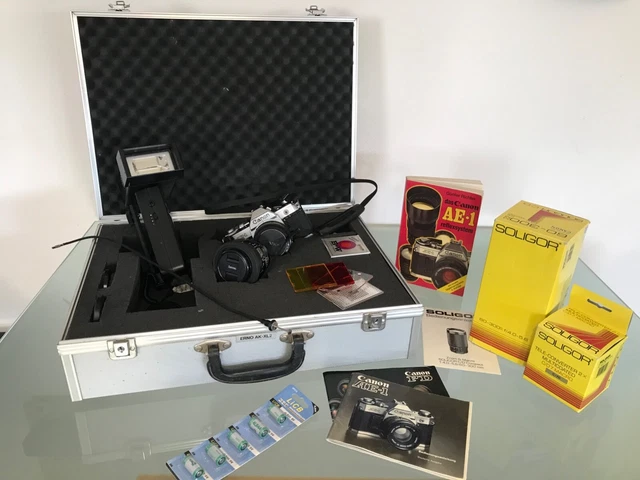 canon ae-1, Set: 1xKamera,4xObjektiv (Soligur&Canon),Bauer Blitzlicht,Koffer,etc