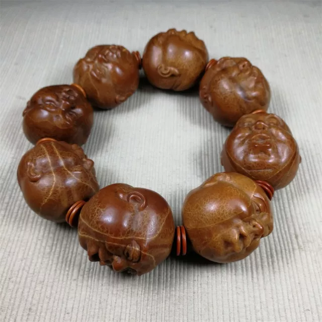 32-33MM Collection Ancient Nature Olive Pit Buddha Head Beads Bracelet