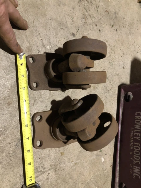  2 Antique Phoenix Caster Co machine or safe double roller cast iron wheels