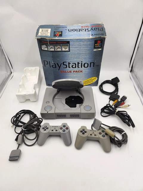 CONSOLE PLAYSTATION 1 EN BOITE + 2 manettes + 15 JEUX