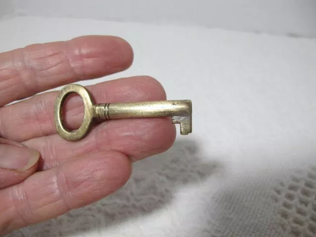 Brass 2" Oval Head Skeleton Key w Hole End of Barrel