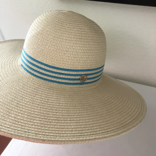 Adrienne Vittadini Straw wide-brimmed hat with blue ribbon trim and gold logo