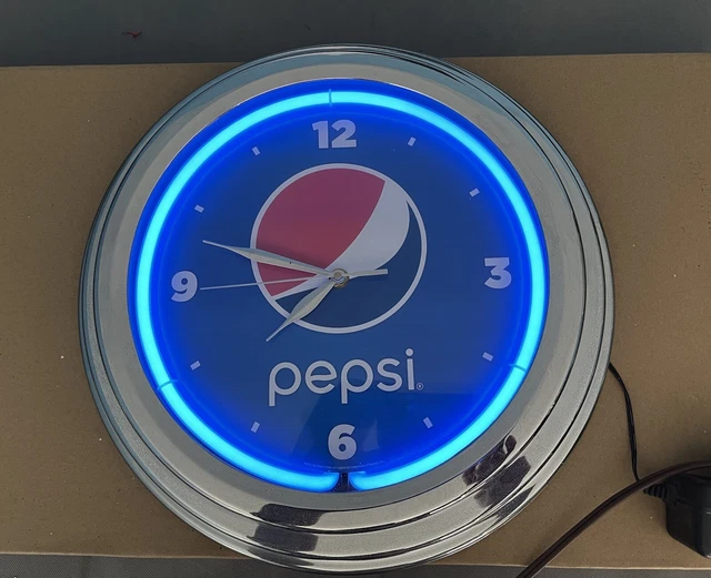 pepsi light up clock, neon blue, nostalgic design. used, but works perfectly.