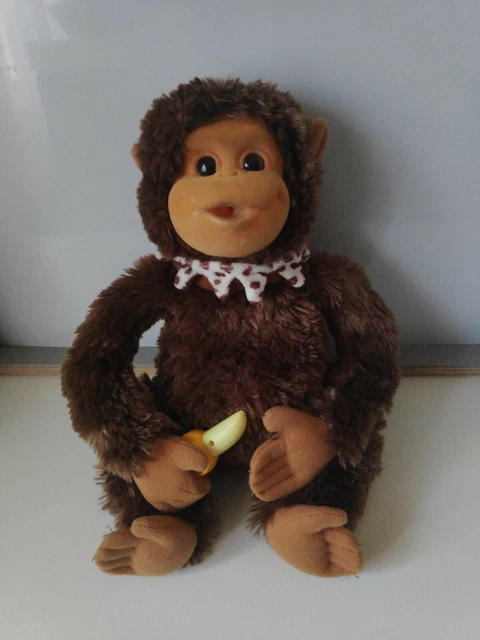 Peluche singe store interactif