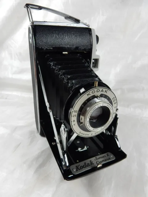 Hermosa cámara de fuelle vintage KODAK Junior II con instrucciones y estuche
