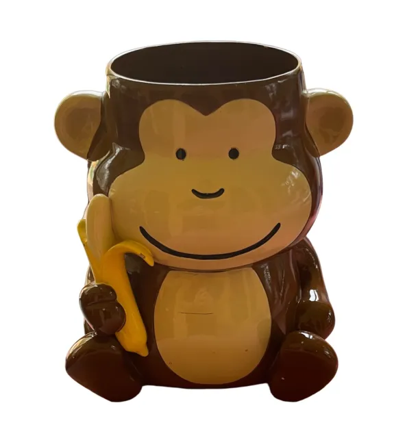 Mono con bote de basura de plátano/cesta de basura objetivo de circo