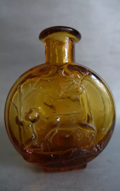 Gourde de chasseur en verre moulé de couleur ambre XIXème