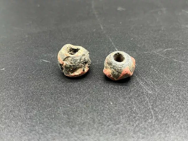 Two ancient Egyptian red and black glass beads, 1st mil BC (A78)