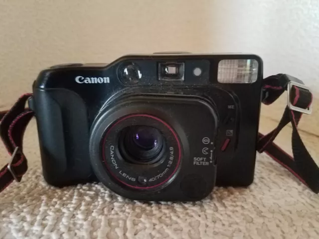 compact canon sure shot tele en assez bon etat et fonctionnel