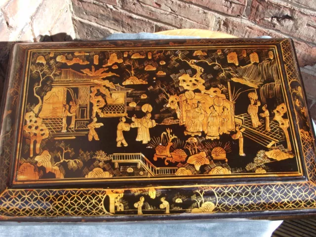 Chinese black and gilt lacquered sarcophagus shaped painted box