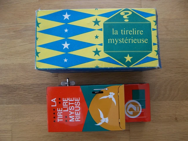 LA TIRELIRE MYSTÉRIEUSE marque Joustra tôle lithographiée moteur testé