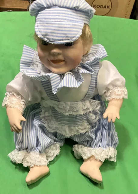 VTG CAMELOT  Sitting Porcelain Baby Boy Doll with blue Clothes 10”