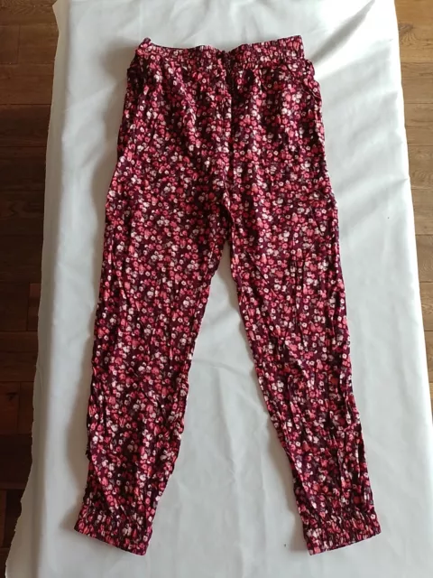 Pantaloni floreali elasticizzati per bambina George età 9-10 con orlo a polsini rosso 16007