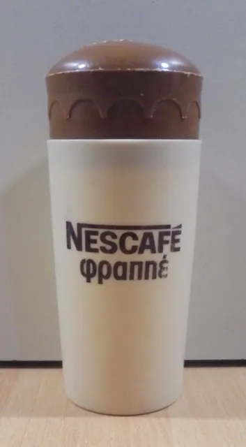 https://www.picclickimg.com/EQUAAOSwZvRjo0DN/Nestle-Nescafe-Frappe-Advertisign-Vtg-Plastic-Shaker.webp