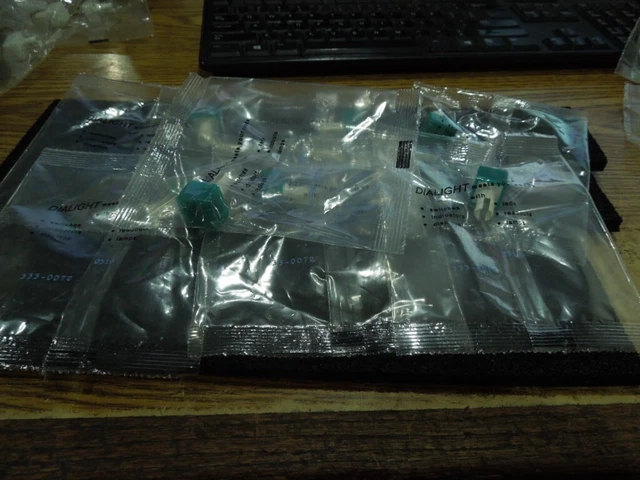 Lot of Dialight P/N:  333-0072 Switch Covers.  Green.  Qty. 7.   New Old Stock