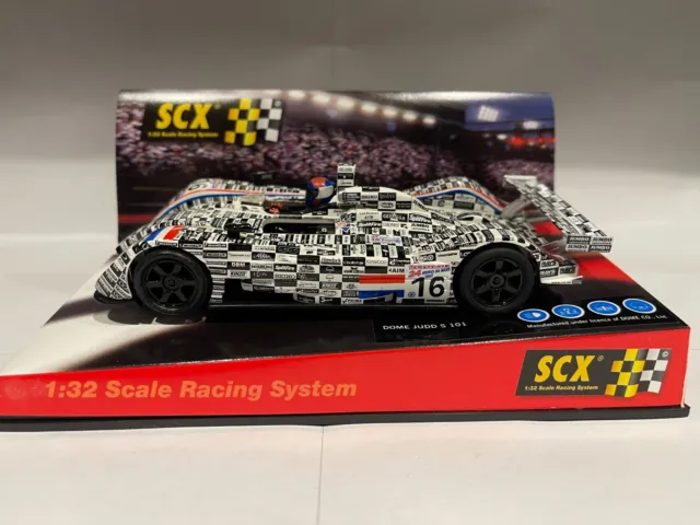 SCX 61160 1/32 Dome Judd S 101 'Holland' Slot Car. Black/White. No. 16