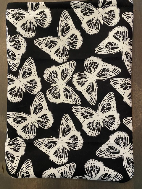 New, handmade book sleeve. black with white butterflies