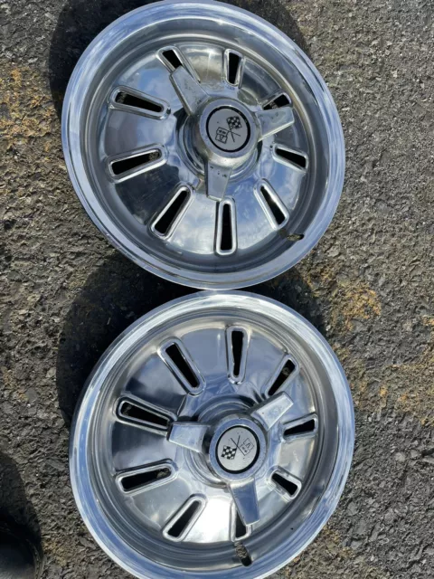 1964 Chevrolet Corvette Spinner 15” original hubcaps set 2