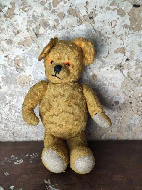 A Vintage golden Teddy Bear with jointed limbs and growler (AF)