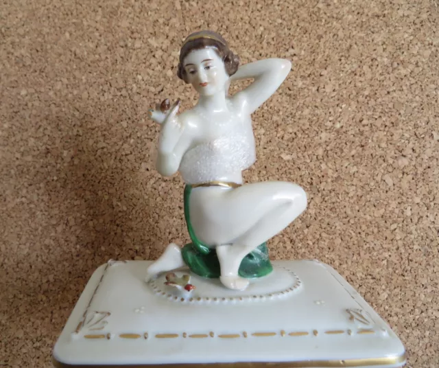 Beautiful vintage porcelain nude lady with bird