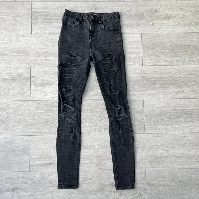Washed black flap sales rip jamie jeans