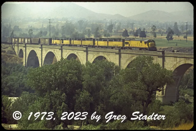 Union Pacific U30C #2838 + 3 DD35s at Santa Ana River near Riverside, CA (1973)