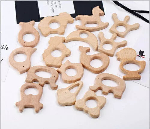 12x Beißringe aus Holz in verschiedenen Formen Schnuller Ring Baby Spielzeu V9Y8