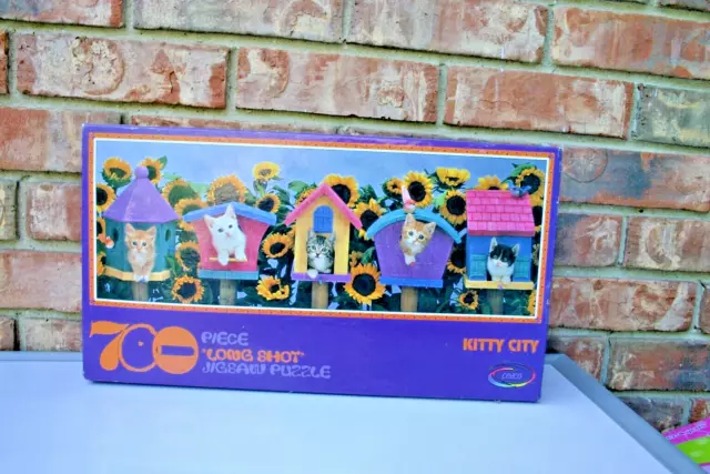 brand new sealed Kitty City 700 pc jigsaw puzzle cats in houses Long Shot caeco