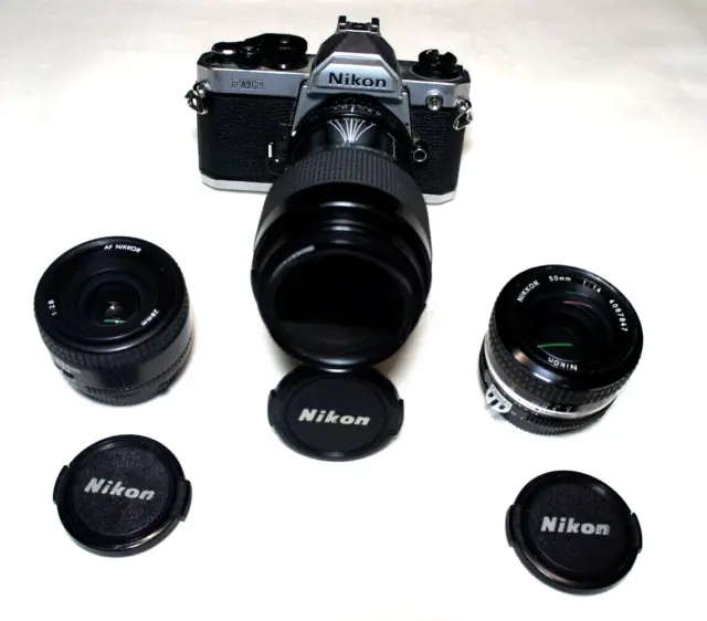 Nikon FM2 35mm Film Camera w 28mm, 50mm & 70-210mm Zoom Lens Sold As Is-A30604