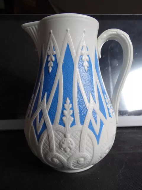 ARCHES & SCROLLS relief moulded blue and white stoneware jug WT COPELAND & SONS