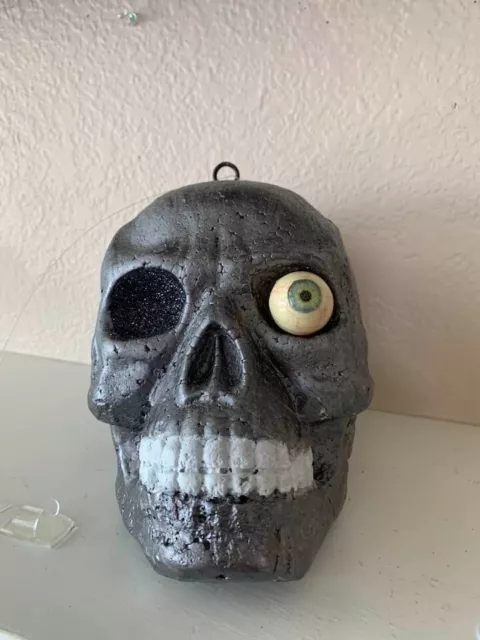 Styrofoam Silver Skull Head w/ green eyes, grinning, Halloween, Goth, Skeleton